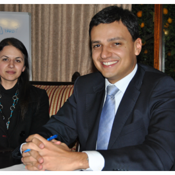 Teacher Ellen and Murilo from Brazil in a business English lesson