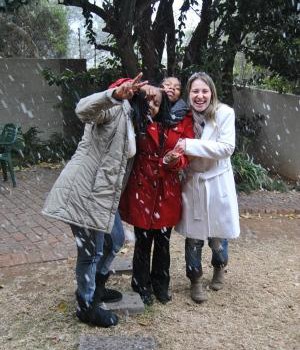 Celma from Angola, Mariam from SA and Caroline from Brazil enjoying a burst of sudden snowfall in Johannesburg!